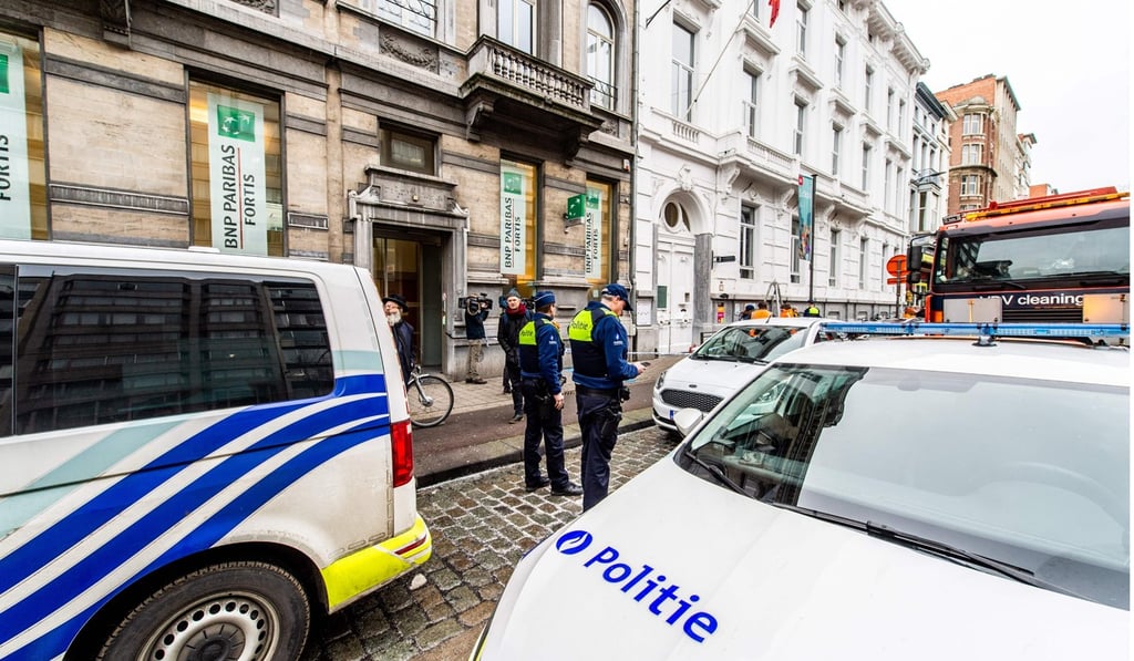 Police cordon off the area outside the BNP Paribas Fortis bank branch after the robbery. Photo: AFP