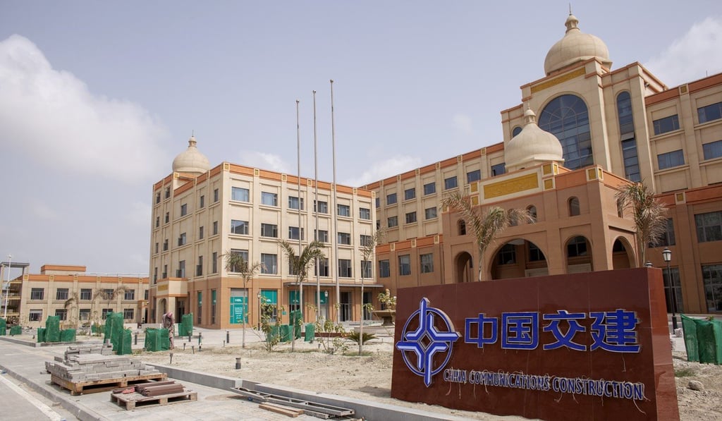 Construction materials lie near a sign outside the China Communication Construction building in the Gwadar Free Zone, operated by China Overseas Ports Holding Company, in Gwadar, Pakistan, in July 2018. China’s increased investment in Pakistan, along with the number of Chinese living there, makes the India-Pakistan rivalry of great interest to Beijing. Photo: Bloomberg