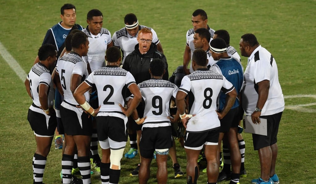 Ben Ryan speaks to his players at half-time during the men’s Olympic final in Rio. Photo: AFP