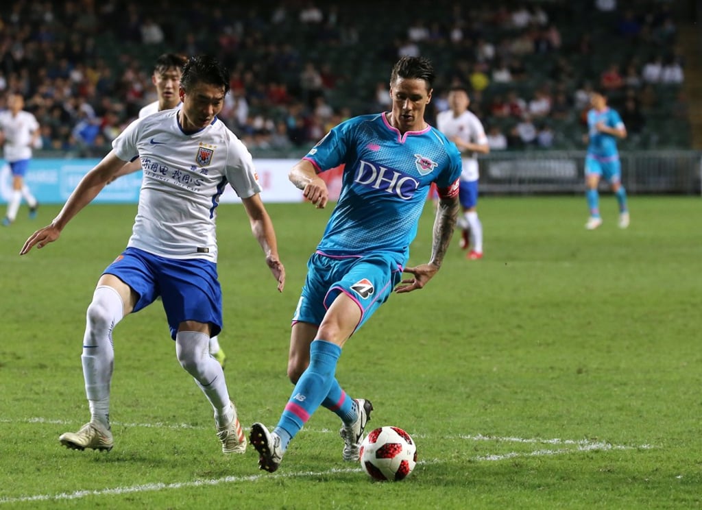 The Hong Kong crowd was firmly behind star striker Fernando Torres.