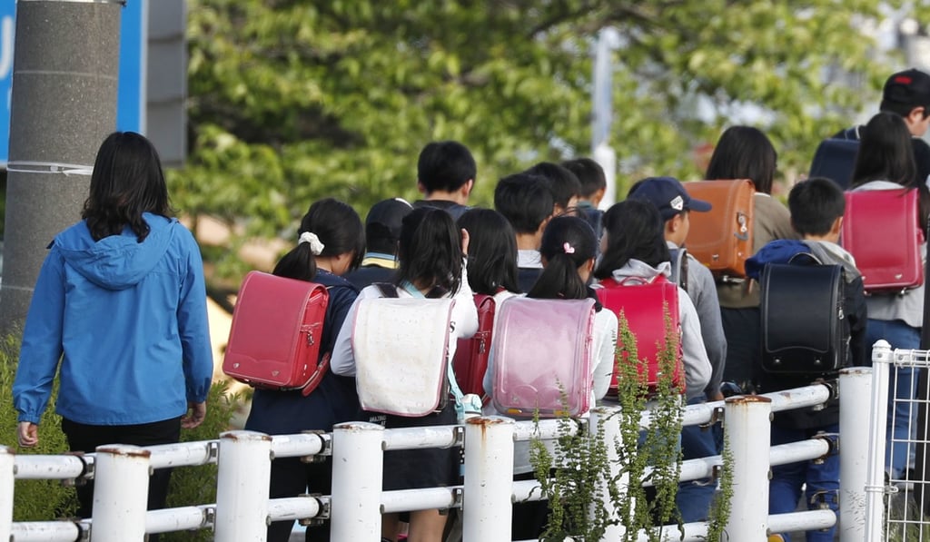Japanese police reported a record 80,104 children aged below 18 were suspected of being abused last year. Photo: Kyodo