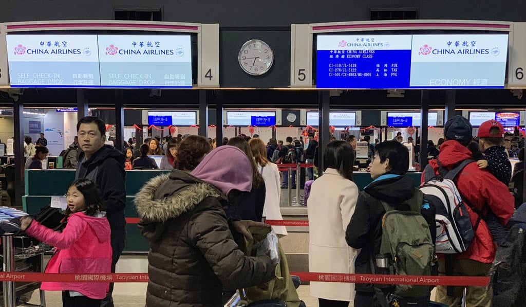 Travellers at the China Airlines booth at Taoyuan International Airport in Taipei, Taiwan. Photo: CNA