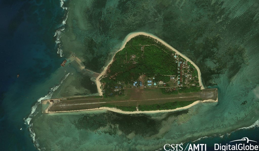 Satellite imagery shows the Philippine work to build a beaching ramp on Thitu in December. Photo: AMTI