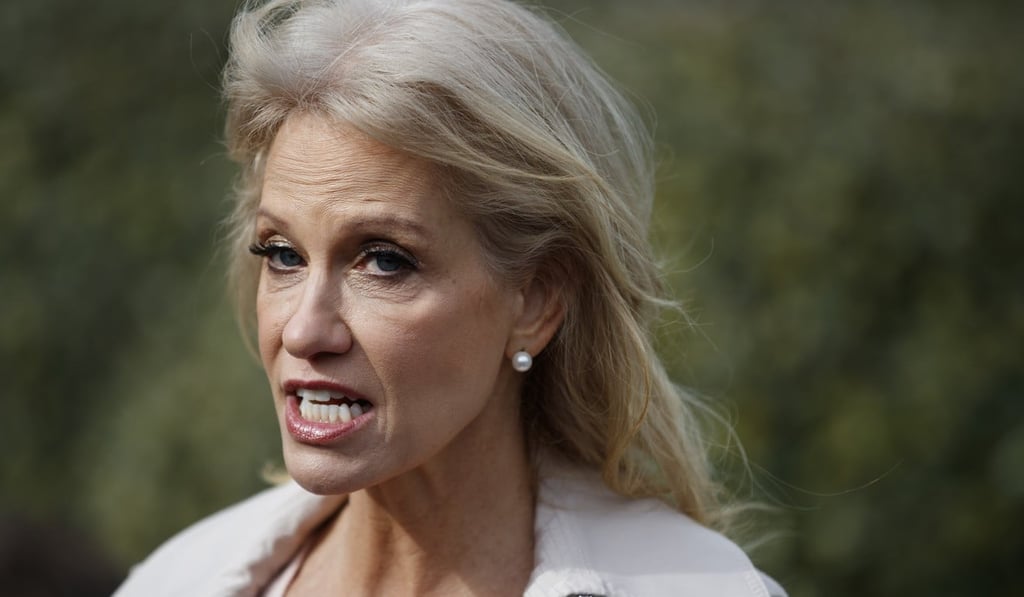 White House senior adviser Kellyanne Conway talks with reporters outside the White House in Washington on January 23. Photo: AP