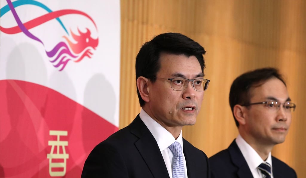 Edward Yau, secretary for commerce and economic development, and Chaucer Leung, deputy director general (telecommunications), at a press conference at Government Offices about the arrangements for switching off analogue television services. Photo: Nora Tam