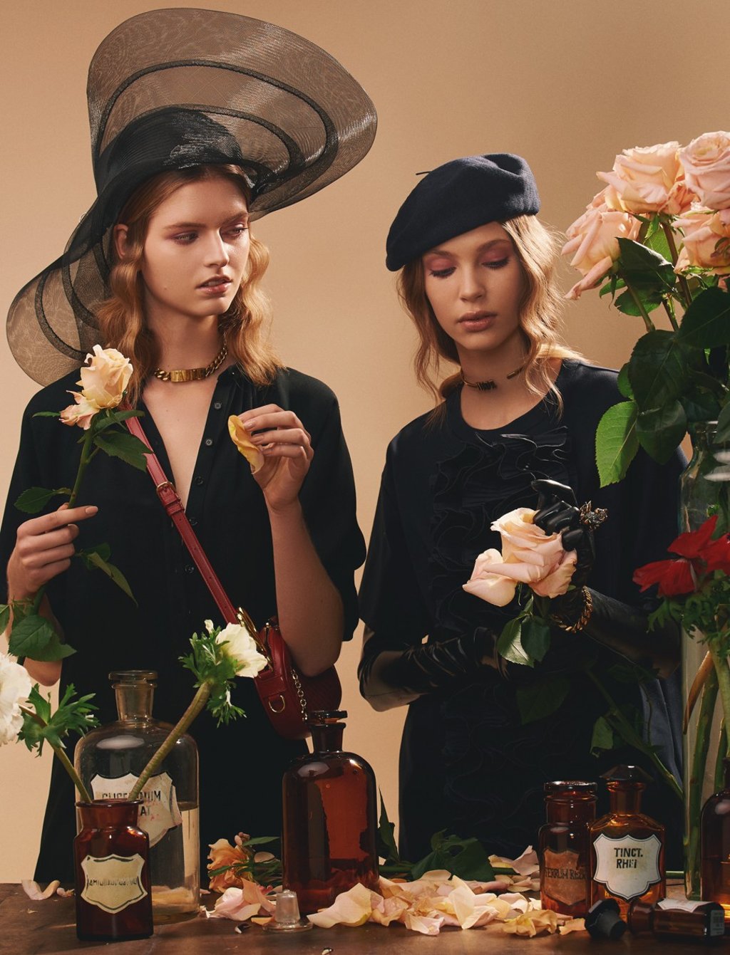 (On left) Celine black acetate and viscose dress, HK$15,650; C Charm bag in red quilted calfskin, HK$8,050; Giorgio Armani hat, HK$5,900; Christian Dior choker with antique gold finish. Price on request; (On right) Christian Dior J’adior bracelet, ring with antique gold finish and grey crystals, beret and choker. Prices on request; Dead Lotus Couture black latex gloves. Price on request; Max Mara blue top, HK$7,280 (On left) Celine black acetate and viscose dress, HK$15,650; C Charm bag in red quilted calfskin, HK$8,050; Giorgio Armani hat, HK$5,900; Christian Dior choker with antique gold finish. Price on request; (On right) Christian Dior J’adior bracelet, ring with antique gold finish and grey crystals, beret and choker. Prices on request; Dead Lotus Couture black latex gloves. Price on request; Max Mara blue top, HK$7,280