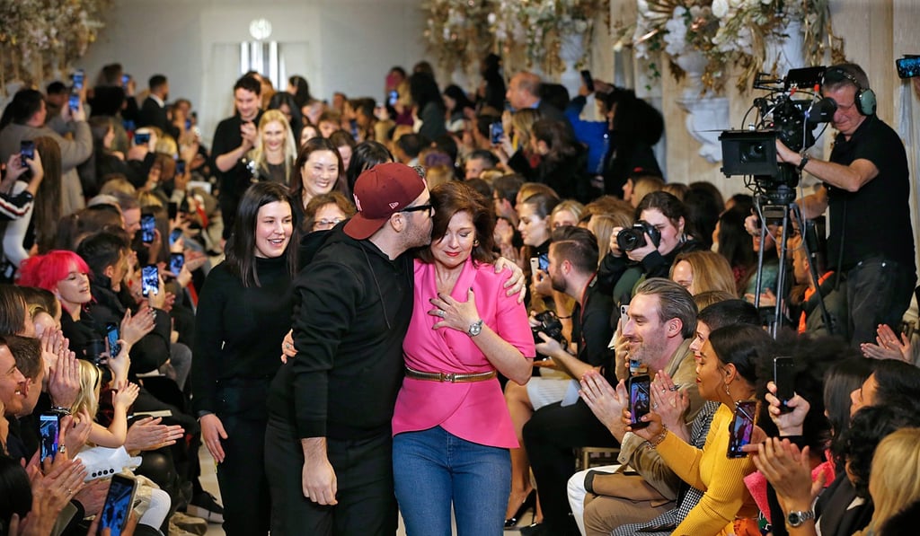 Designer Brandon Maxwell kisses his mum on the runway after his autumn/winter 2019 show. Photo: Jonas Gustavsson, MCV / The Washington Post