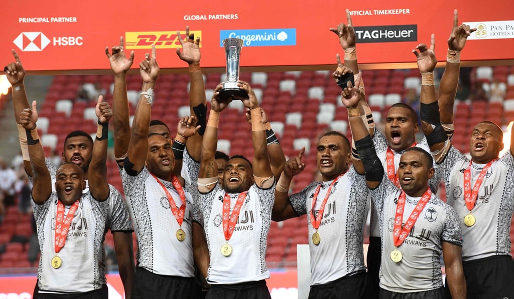 Fiji celebrate their victory in the 2018 Singapore Sevens. Photo: AFP