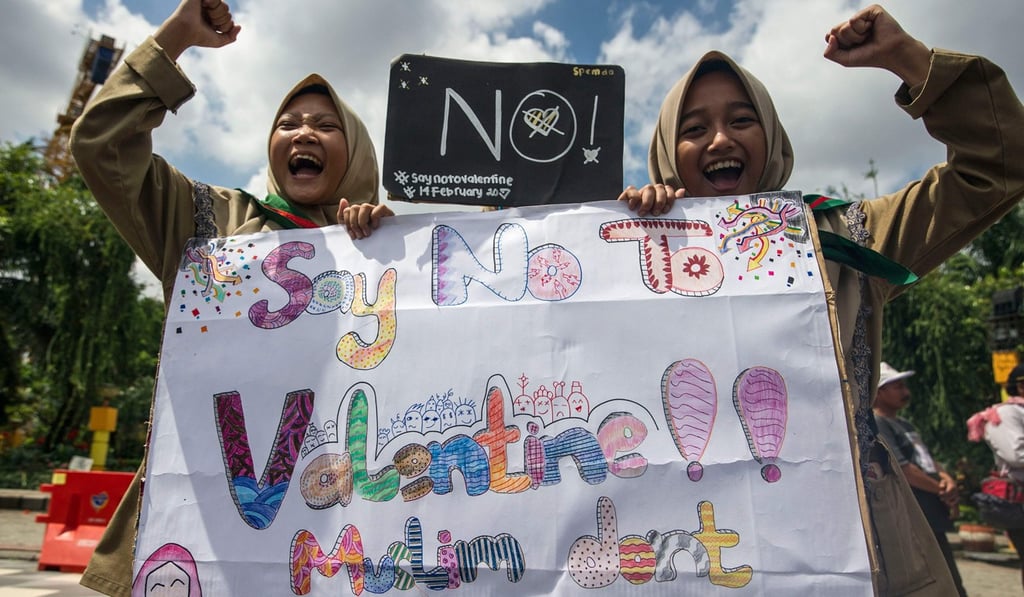 Girls from a local boarding school shout during an anti-Valentine's Day rally in Surabaya, East Java province in 2017. File photo: AFP