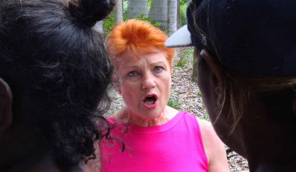 Australian senator Pauline Hanson reacts as she talks with local Aboriginal people in the northern Australian town of Rockhampton in Queensland on November 8, 2017. Photo: Reuters