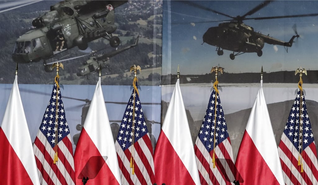 Polish and United States flags are placed together for the arrival of United States Vice-President Mike Pence in Warsaw, Poland. Photo: AP Photo