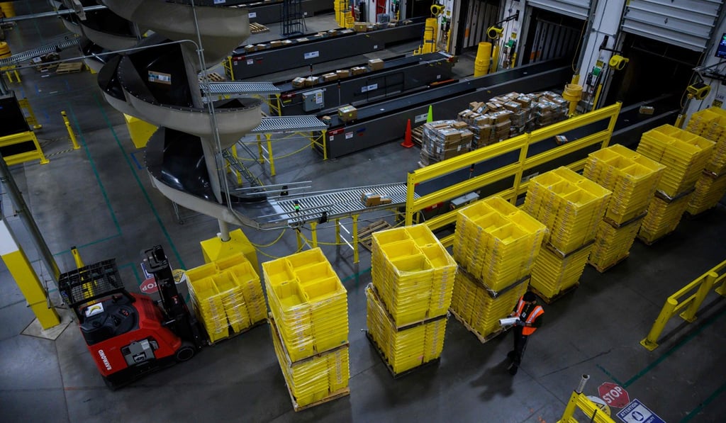 A man works at a distribution station at the 855,000-square-foot Amazon fulfilment centre in Staten Island. Photo: AFP