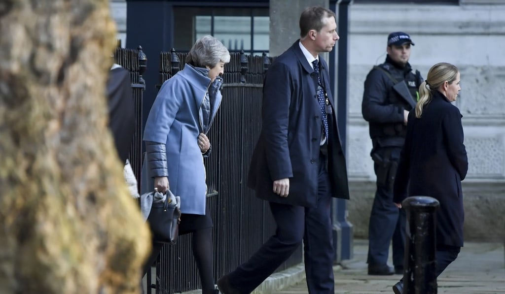 Theresa May leaves 10 Downing Street on her way to parliament in London on Thursday. Photo: Bloomberg