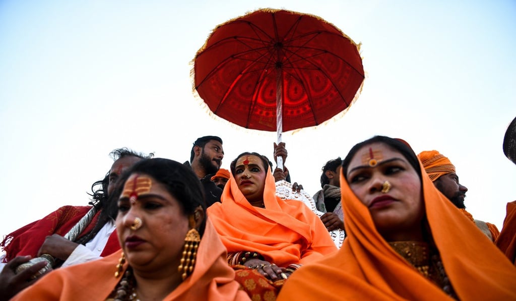 Laxmi Narayan Tripathi, a transgender rights activist and chief of the Kinnar Akhara monastic Hindu order, rides a chariot towards Sangam – the confluence of the Ganges, Yamuna and mythical Saraswati rivers. Photo: AFP Laxmi Narayan Tripathi, a transgender rights activist and chief of the Kinnar Akhara monastic Hindu order, rides a chariot towards Sangam – the confluence of the Ganges, Yamuna and mythical Saraswati rivers. Photo: AFP
