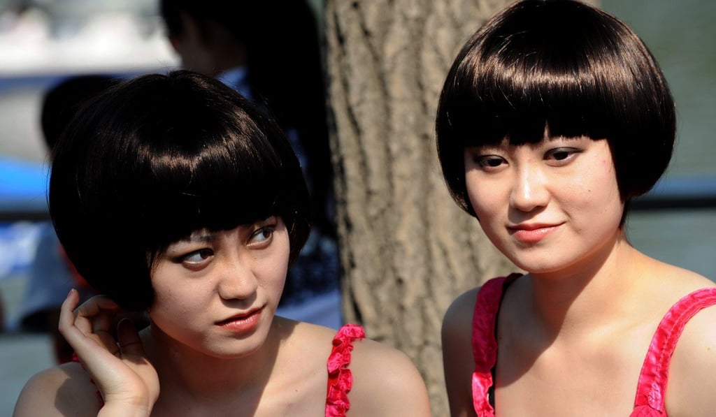 Identical Chinese twins. “We would essentially be the same person if we had been adopted at birth and raised in a different family,” says Robert Plomin, King’s College London professor of behavioural genetics. Photo: AFP