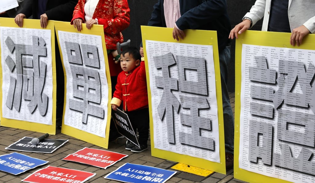 Protesters gather on February 10 to petition against the migrant scheme allowing in 150 mainlanders daily. Photo: Nora Tam