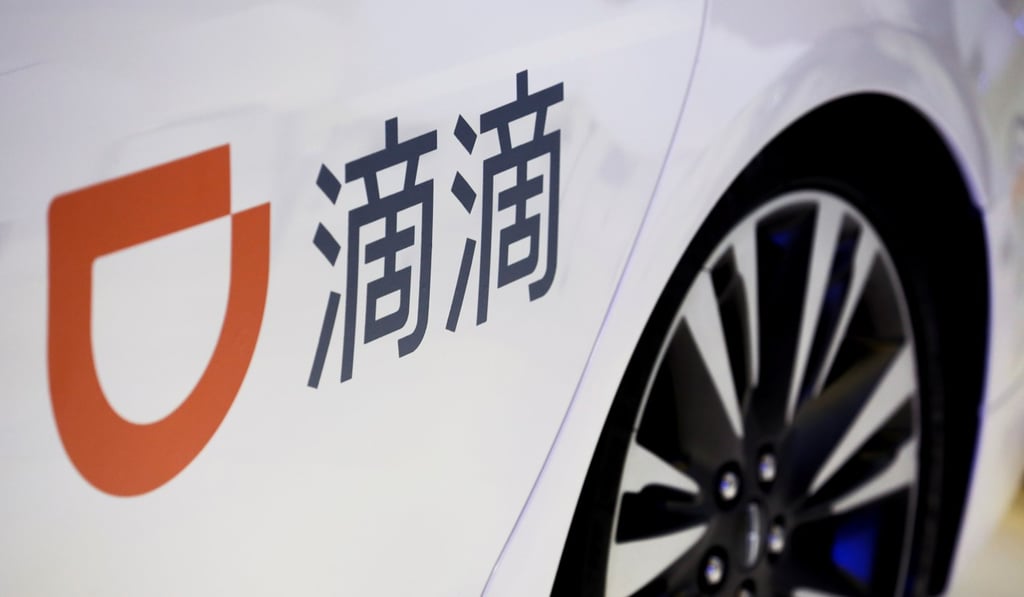 The company logo of the Didi Chuxing ride hailing app is seen on a car door at the IEEV New Energy Vehicles Exhibition in Beijing in this file photo. Photo: Reuters