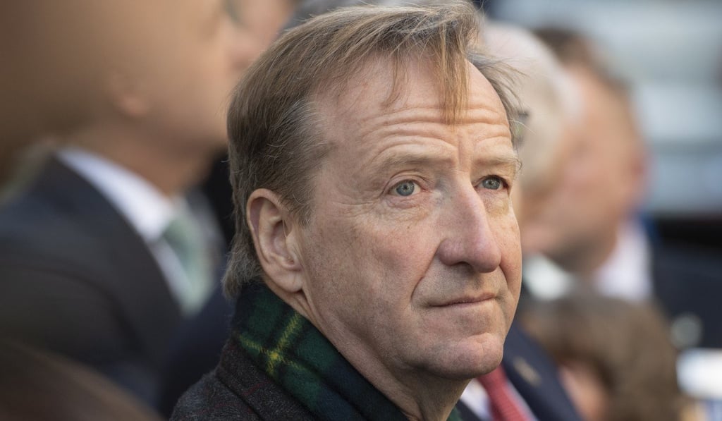 Head of MI6, Alexander Younger, waits for a visit of Britain's Queen Elizabeth outside Watergate House to mark the centenary the United Kingdom's Intelligence, Security and Cyber Agency (GCHQ) in London on Thursday. Photo: EPA Head of MI6, Alexander Younger, waits for a visit of Britain's Queen Elizabeth outside Watergate House to mark the centenary the United Kingdom's Intelligence, Security and Cyber Agency (GCHQ) in London on Thursday. Photo: EPA