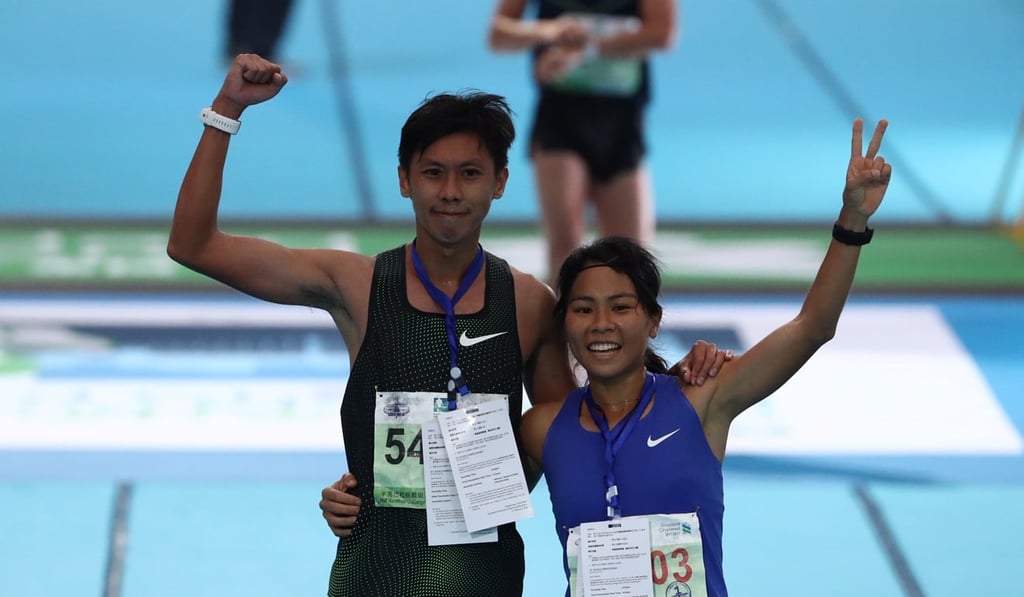 Christy Yiu kit-Ching wins the women’s half marathon while her husband Chan Ka-ho came third in the men’s. Photo: Nora Tam