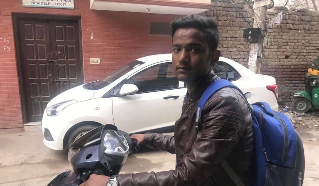 Rinku Chaudhary, 21, works as a delivery executive at Swiggy but wants a better job – and thinks the government should help. Photo: Manira Chaudhary