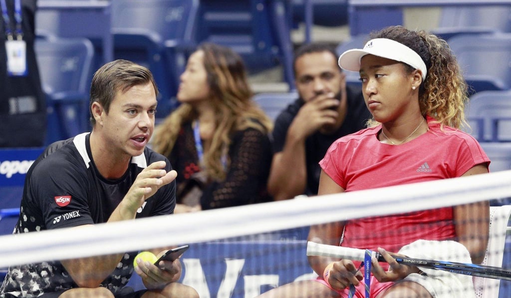 Naomi Osaka listens to former coach Sascha Bajin at the US Open, where she won her first grand slam. Photo: Kyodo Naomi Osaka listens to former coach Sascha Bajin at the US Open, where she won her first grand slam. Photo: Kyodo