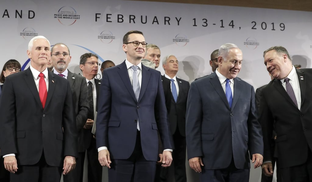 United States Vice President Mike Pence, Prime Minister of Poland Mateusz Morawiecki, Israeli Prime Minister Benjamin Netanyahu and United State Secretary of State Mike Pompeo, from left, stand on a podium at a conference on Peace and Security in the Middle East in Warsaw, Poland. Photo: AP Photo