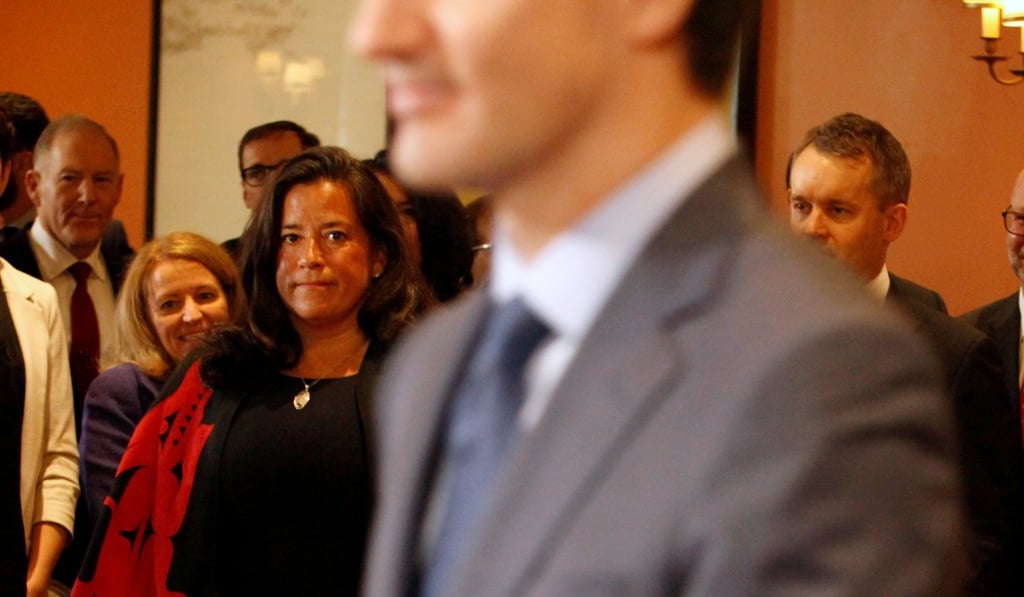 Jody Wilson-Raybould, who was Canada’s first indigenous attorney general and justice minister, watching Trudeau at a cabinet meeting in January. She left the cabinet this month. Photo: Reuters