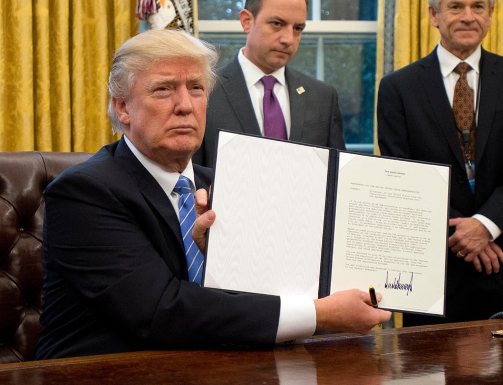 US President Donald Trump withdrawing the US from the Trans-Pacific Partnership (TPP). Photo: Handout