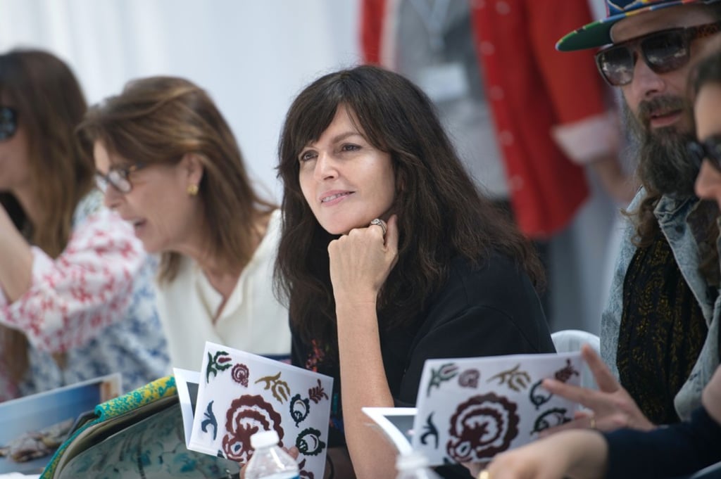 Virginie Viard (second right) among jury members looking at creations during the 30th edition of the International Festival of Fashion and Photography in Hyeres, southeastern France on April 24, 2015. Photo: AFP Virginie Viard (second right) among jury members looking at creations during the 30th edition of the International Festival of Fashion and Photography in Hyeres, southeastern France on April 24, 2015. Photo: AFP