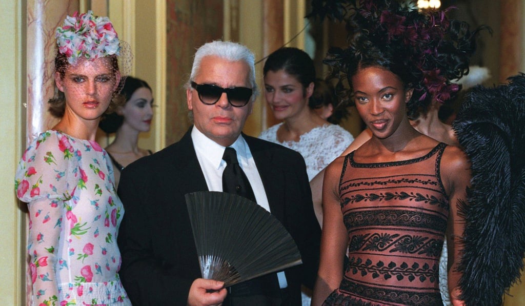 British models Stella Tennant (left) and Naomi Campbell pose with Karl Lagerfeld after Chanel’s spring/summer 1997 high fashion collection in January 1997. Photo: Reuters