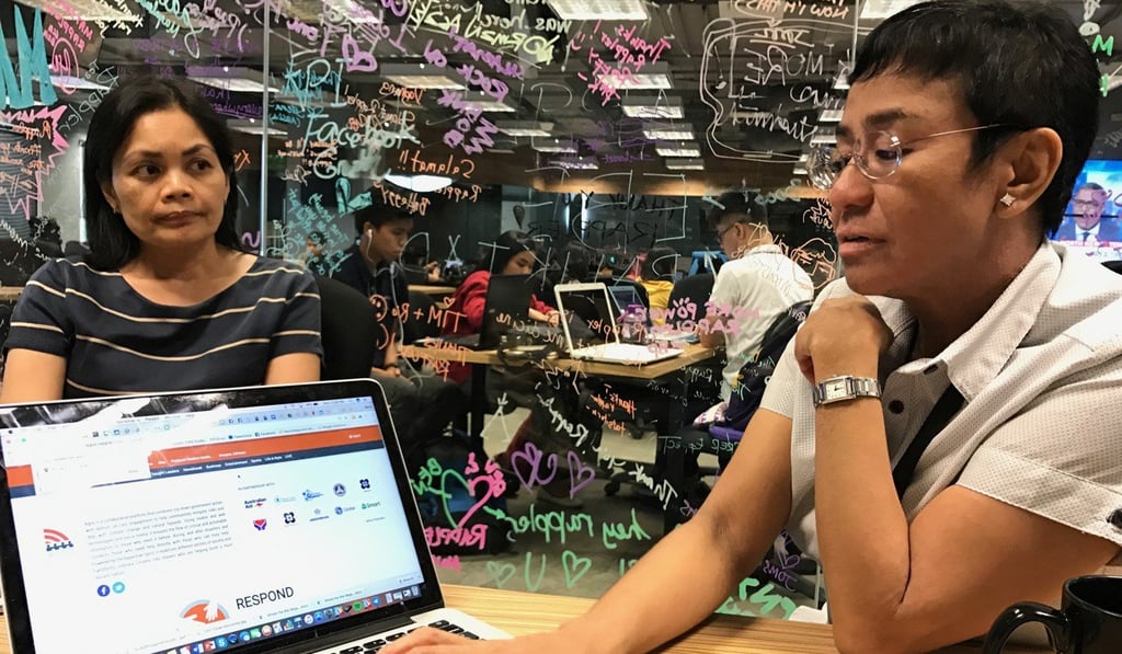 Managing editor Glenda Gloria and chief executive Maria Ressa in the Rappler newsroom. Photo: Cherian George