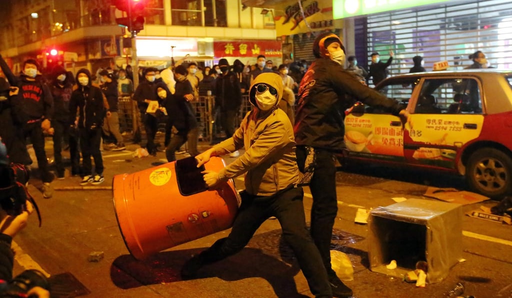 Rioters and police clash in Mong Kok in February 2016. Photo: Edward Wong