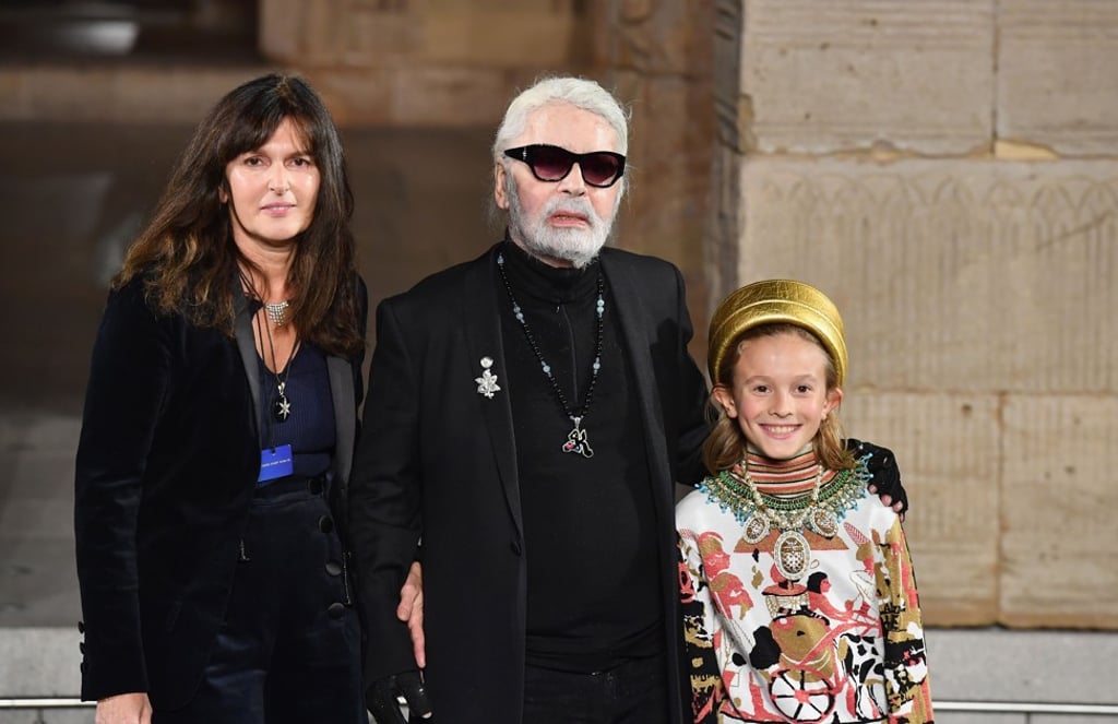 Virginie Viard (left), with Karl Lagerfeld and his godson Hudson Kroenig during the Chanel métiers d’Art show in New York in December last year. Photo: AFP Virginie Viard (left), with Karl Lagerfeld and his godson Hudson Kroenig during the Chanel métiers d’Art show in New York in December last year. Photo: AFP