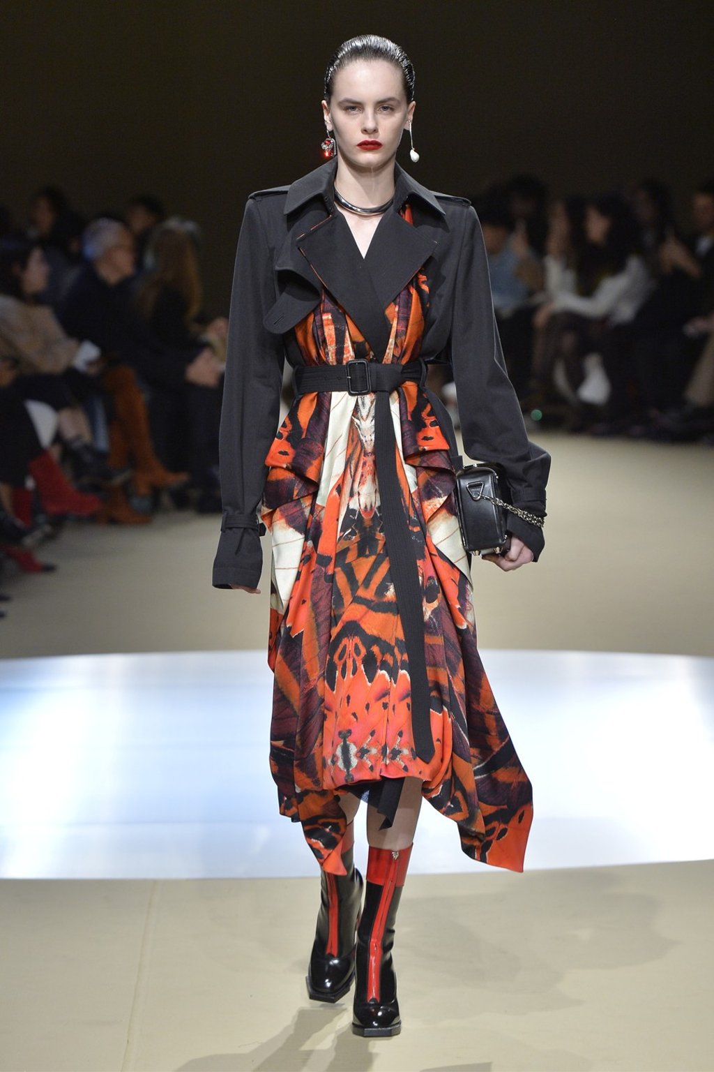 Life as luxury stylish and personal shopper to billionaires means Nicole Pollard Bayme often sits in the front row at fashion events, such as an Alexander McQueen collection show (above).