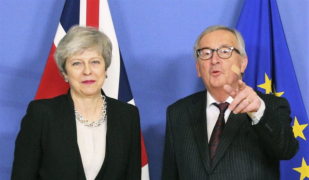British Prime Minister Theresa May and European Commission President Jean-Claude Juncker. Photo: Kyodo
