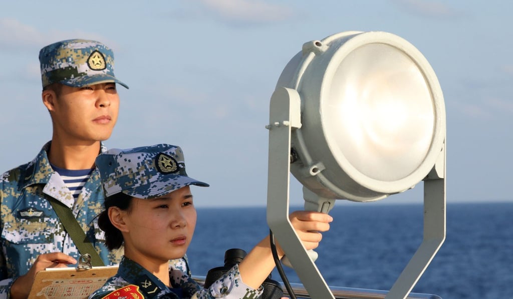 Sailors use light signals aboard the guided missile destroyer Hefei during an air-defence and anti-missile drill in the Pacific. Photo: eng.chinamil.com.cn