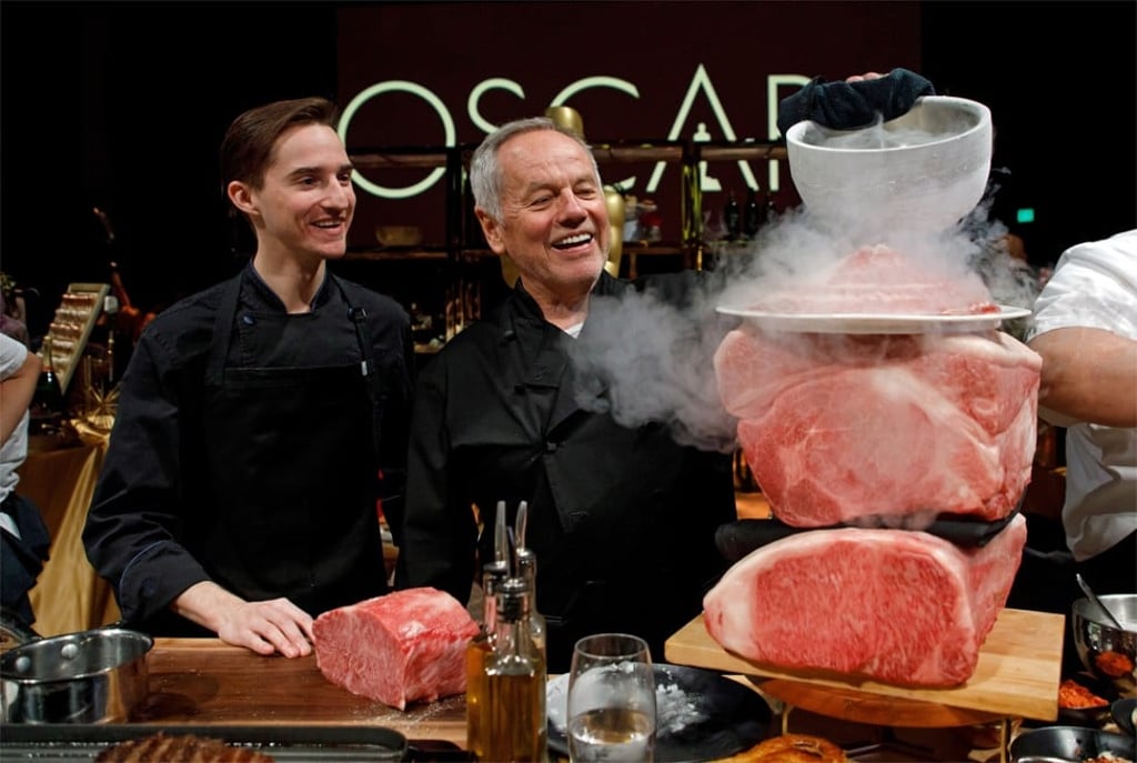Puck pours liquid nitrogen over Japanese miyazaki wagyu beef as his son Byron looks on. Photo: EPA-EFE/Eugene Garcia Puck pours liquid nitrogen over Japanese miyazaki wagyu beef as his son Byron looks on. Photo: EPA-EFE/Eugene Garcia