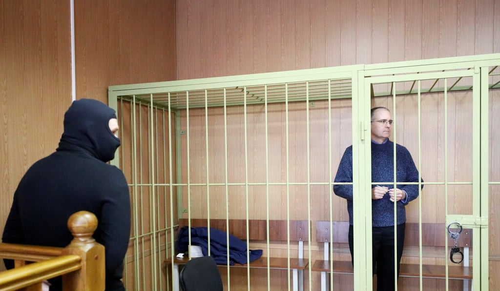 Former US marine Paul Whelan who is being held on suspicion of spying, stands in the courtroom cage. Photo: Reuters