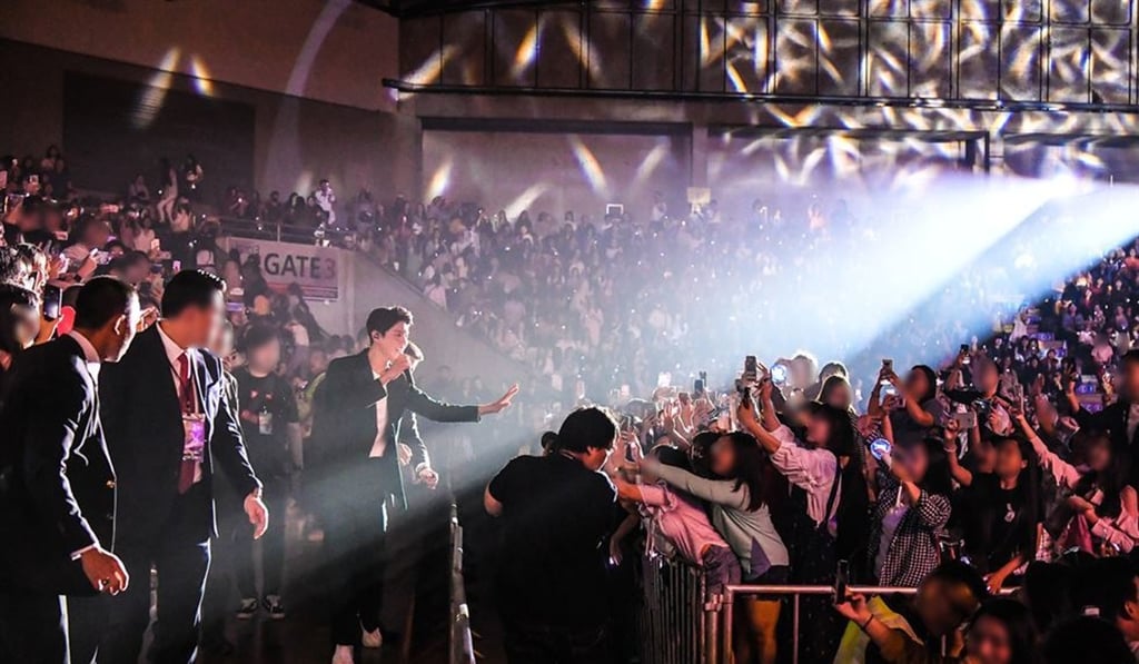 South Korean actor Park Bo-gum waves to his adoring fans at Bangkok’s Thunder Dome on Saturday. Photo: Blossom Entertainment