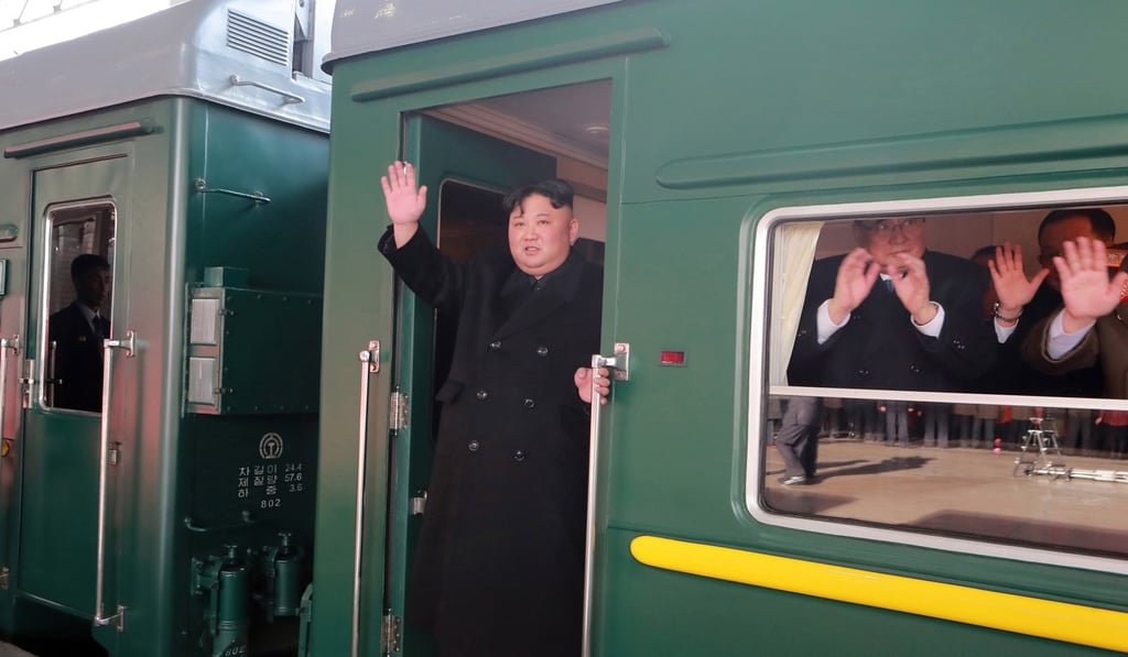 North Korean leader Kim Jong-un waves as he boards a train in Pyongyang. Photo: EPA North Korean leader Kim Jong-un waves as he boards a train in Pyongyang. Photo: EPA