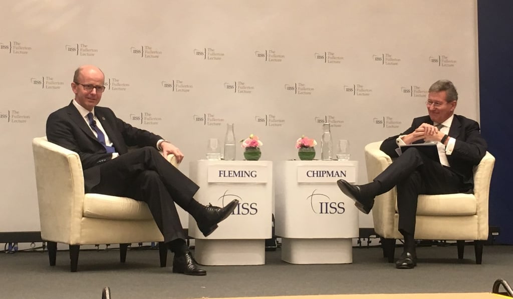 Jeremy Fleming (left) with Dr John Chipman, Director-General and Chief Executive of the International Institute for Strategic Studies (IISS). Photo: Ng Jing Yng