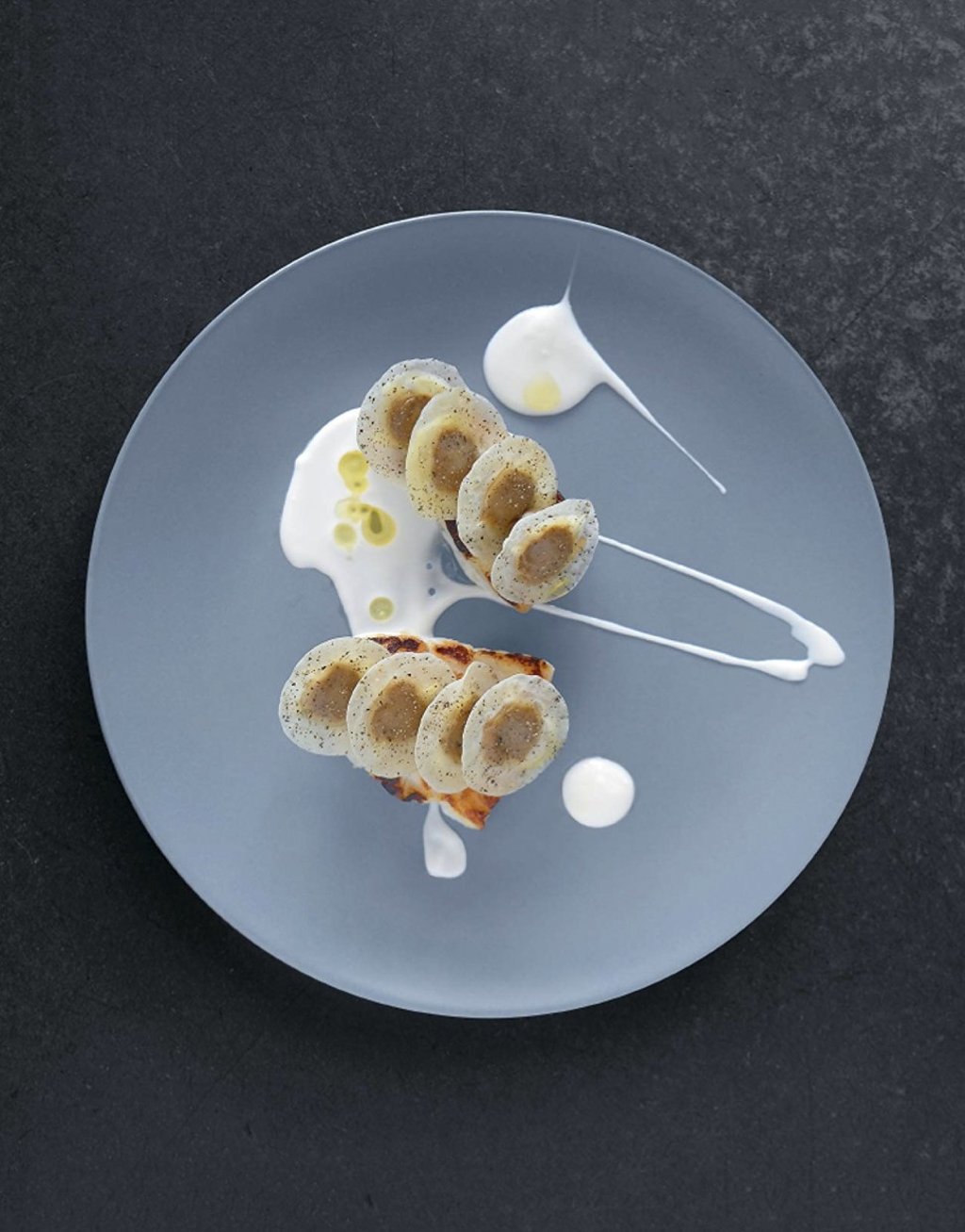 Turbot with fennel ravioli on gruyere by Bech, inspired by customer Jorn Utzon’s design for the Sydney Opera House.