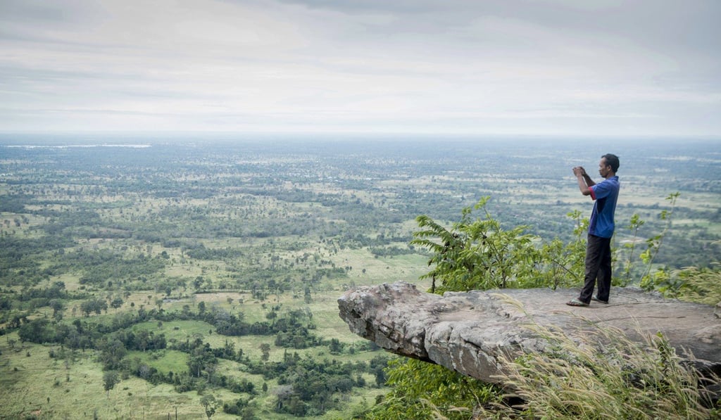 The view from Peuy Ta Mok (Ta Mok’s Cliff) in the Dangrek mountain range north of Anlong Veng. Photo: Alamy