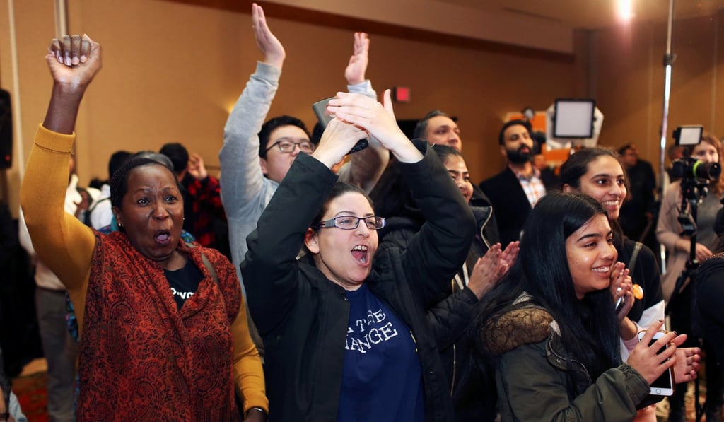 Singh’s supporters cheer as results from polling stations are announced at the Burnaby South by-election. Photo: Reuters
