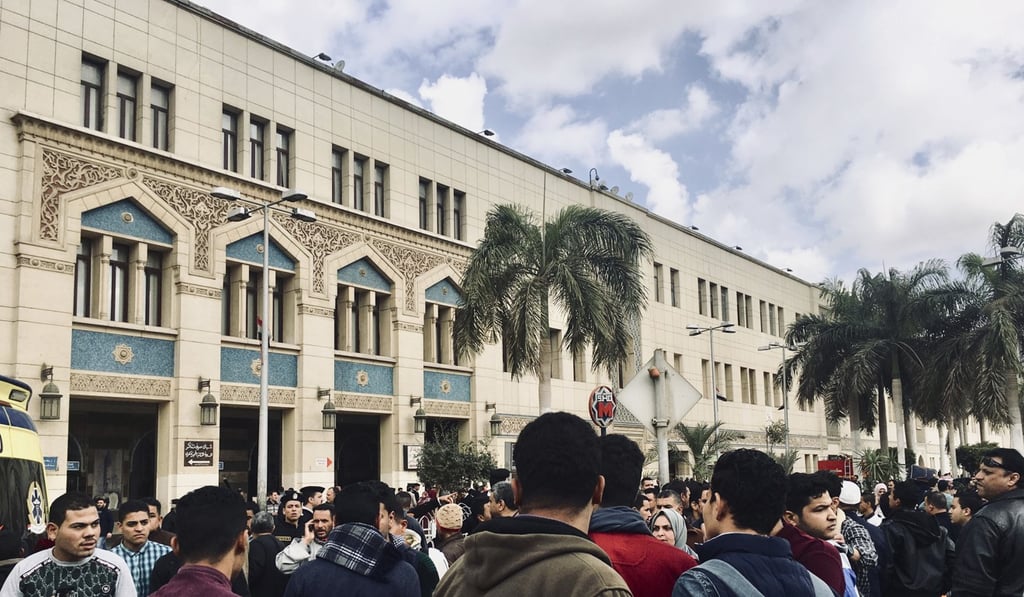 People gather outside Ramses railway station in Cairo. Photo: AP Photo