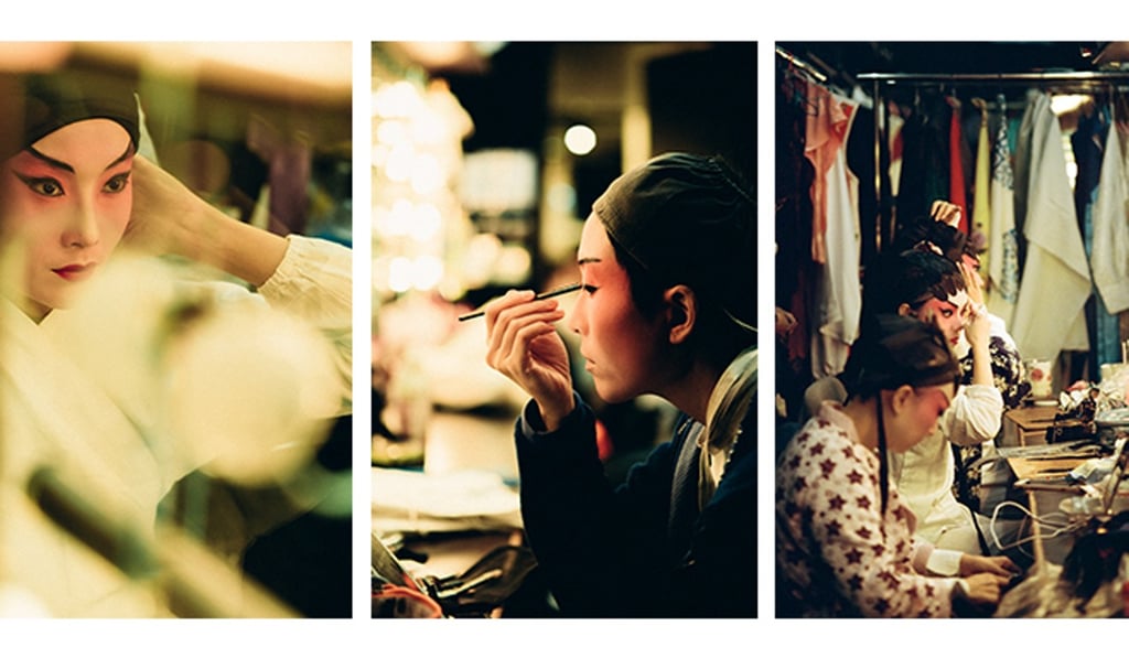 Sam Chan applies the finishing touches of bright red make-up around her eyes as the other performers start to arrive backstage. Photo: Abdela Igmirien Sam Chan applies the finishing touches of bright red make-up around her eyes as the other performers start to arrive backstage. Photo: Abdela Igmirien