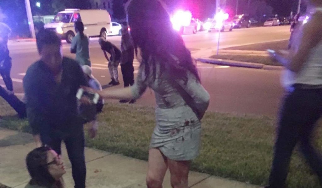 People outside Pulse after the shooting on June 12, 2016. Photo: EPA/Univision Florida Central