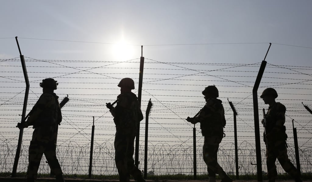 Indian Border Security Force soldiers patrol along the India-Pakistan border, near Amritsar, India. Photo: EPA