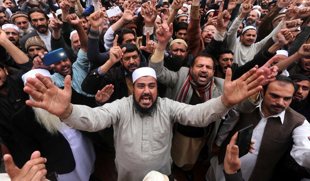 People shout anti-India slogans during a protest in Peshawar, Pakistan, on Friday. Photo: EPA-EFE