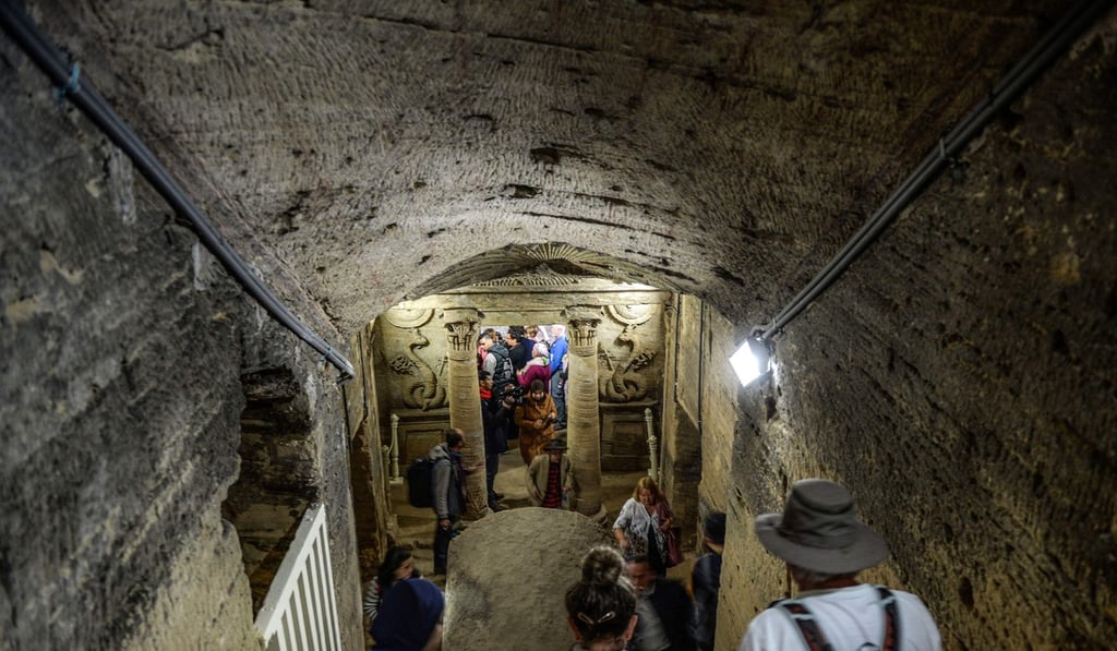 Visitors tour through the catacombs of Kom al-Shoqafa (Mound of Shards). Photo: AFP